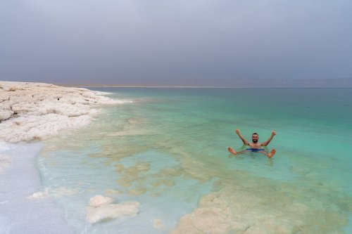 Tourist Floating Dead Sea Jordan
