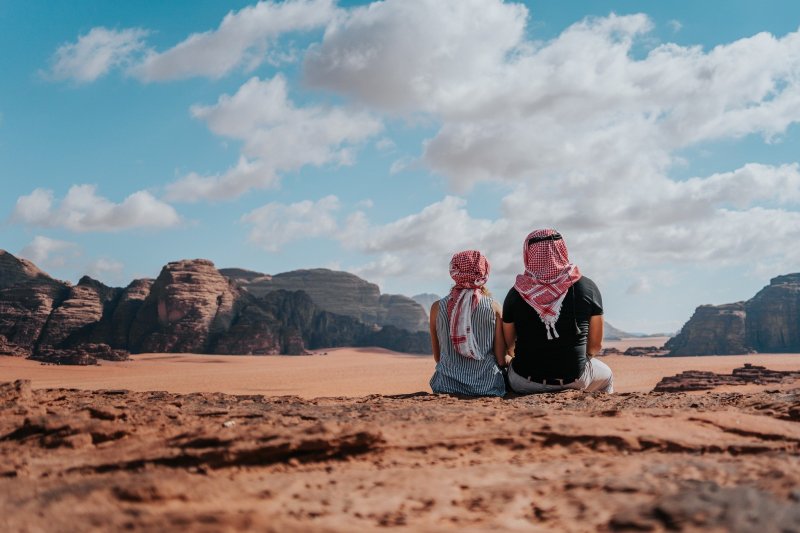 Tourists Overlooking Wadi Rum Dessert
