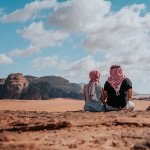 Tourists Overlooking Wadi Rum Dessert