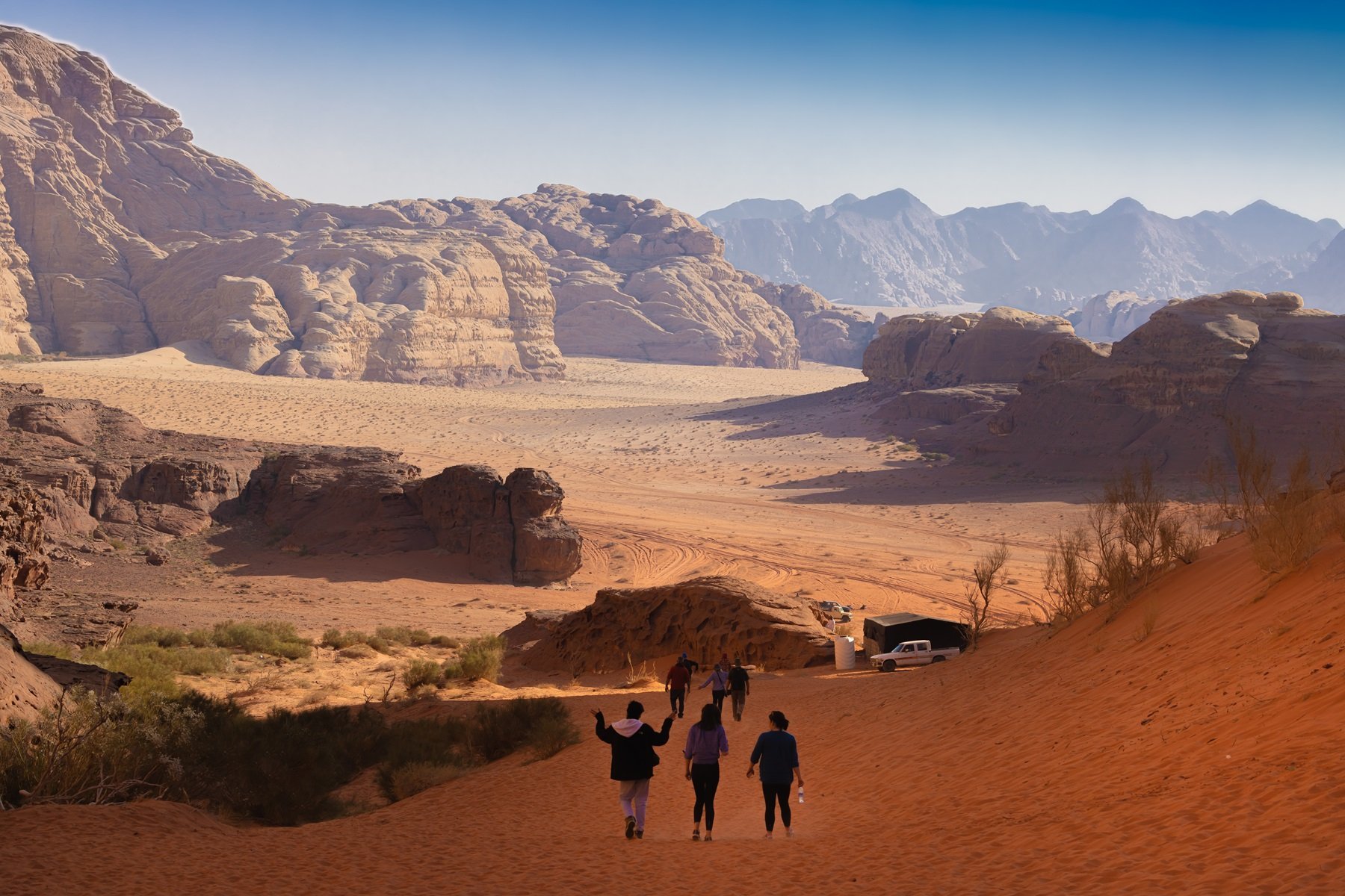 Group Of Tourists Walking In The Wadi Rum Desert