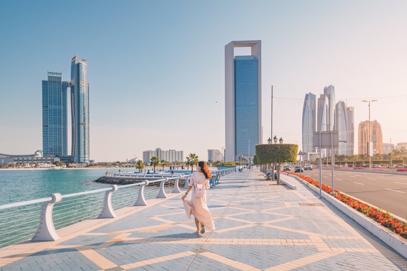 Women Strolling Along The Cornice In Abu Dhabi